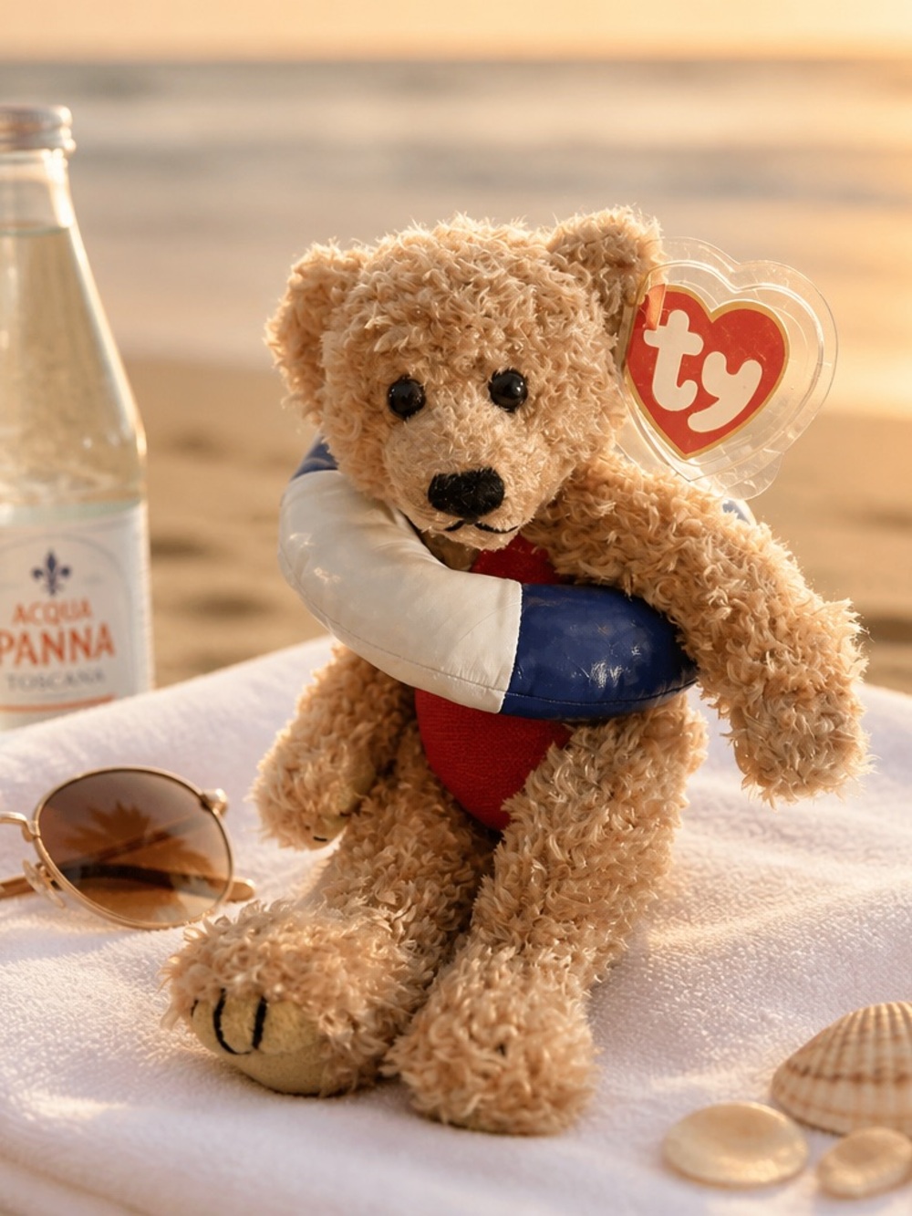 Ty Plush Bear with Red Swimsuit and Blue/White Inflatable Ring